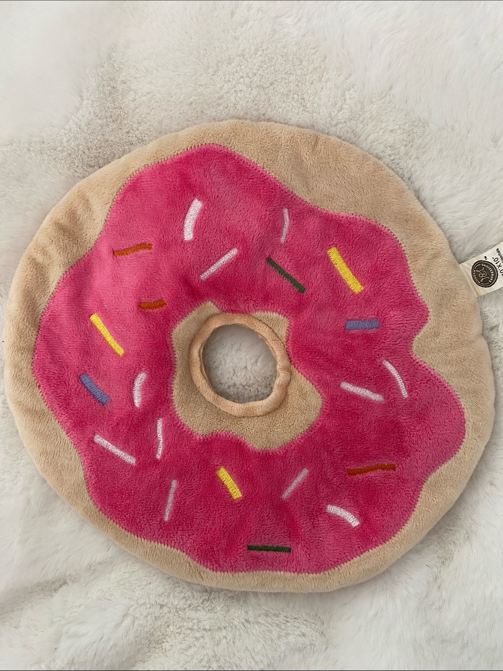 Expressions Pink and Beige Donut Heating Pad with Colorful Sprinkles